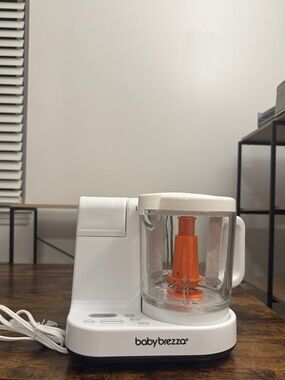 White and Orange Baby Food Maker